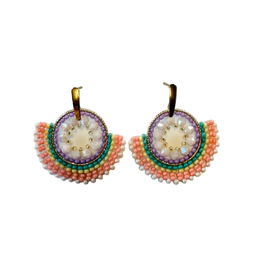 A pair of handmade beaded earrings with gold-tone hooks, featuring circular and semi-circular beadwork in pink, green, purple, and white on a plain light background.