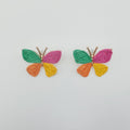 Colorful butterfly-shaped earrings on a light gray background