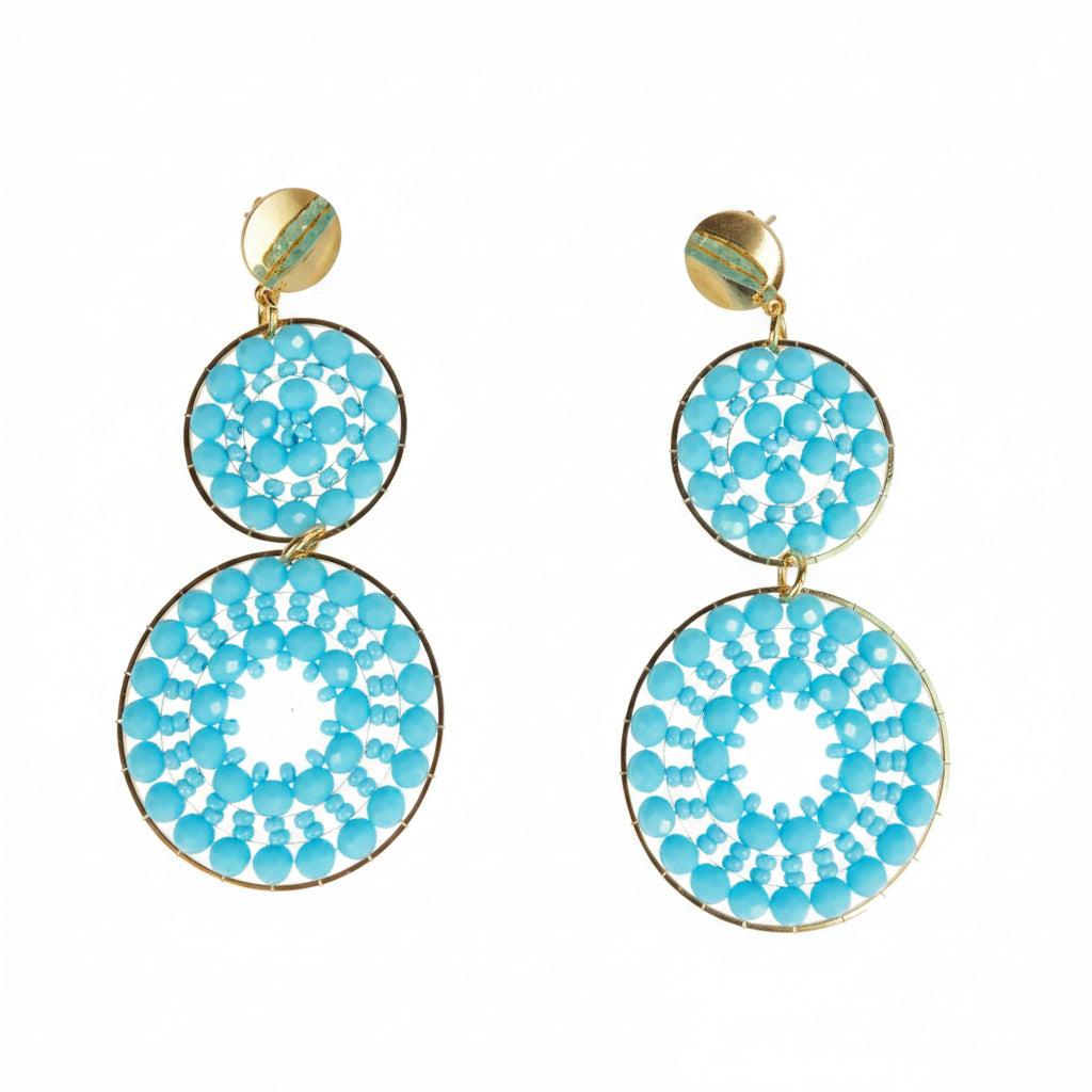 Pair of turquoise earrings with gold accents