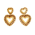 Heart-shaped earrings with gold and brown detailing 