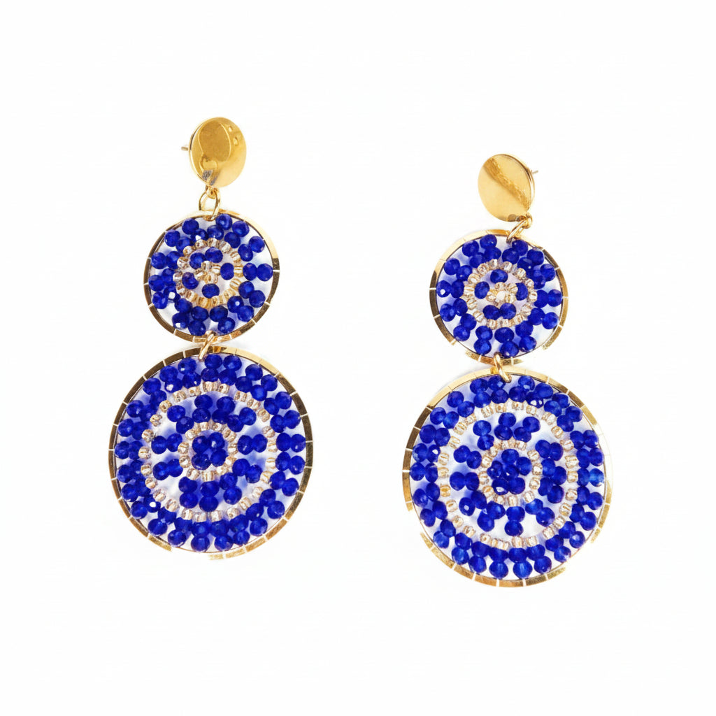 Pair of blue circular earrings with gold accents