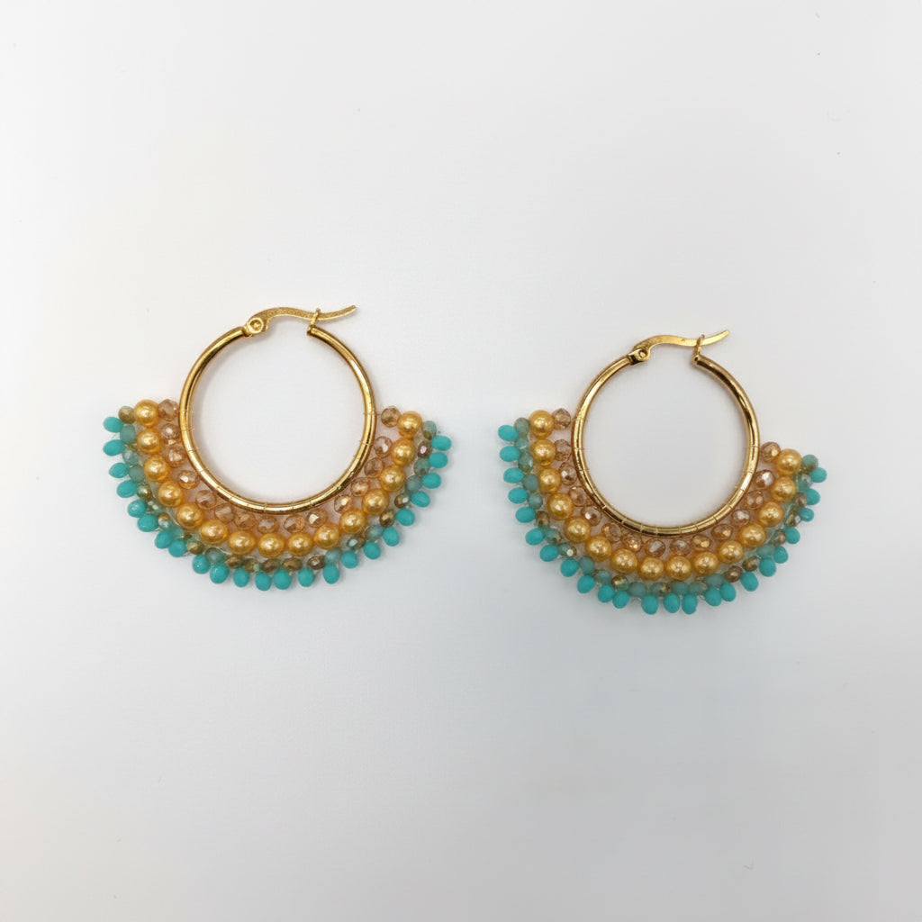 Gold hoop earrings with turquoise beads