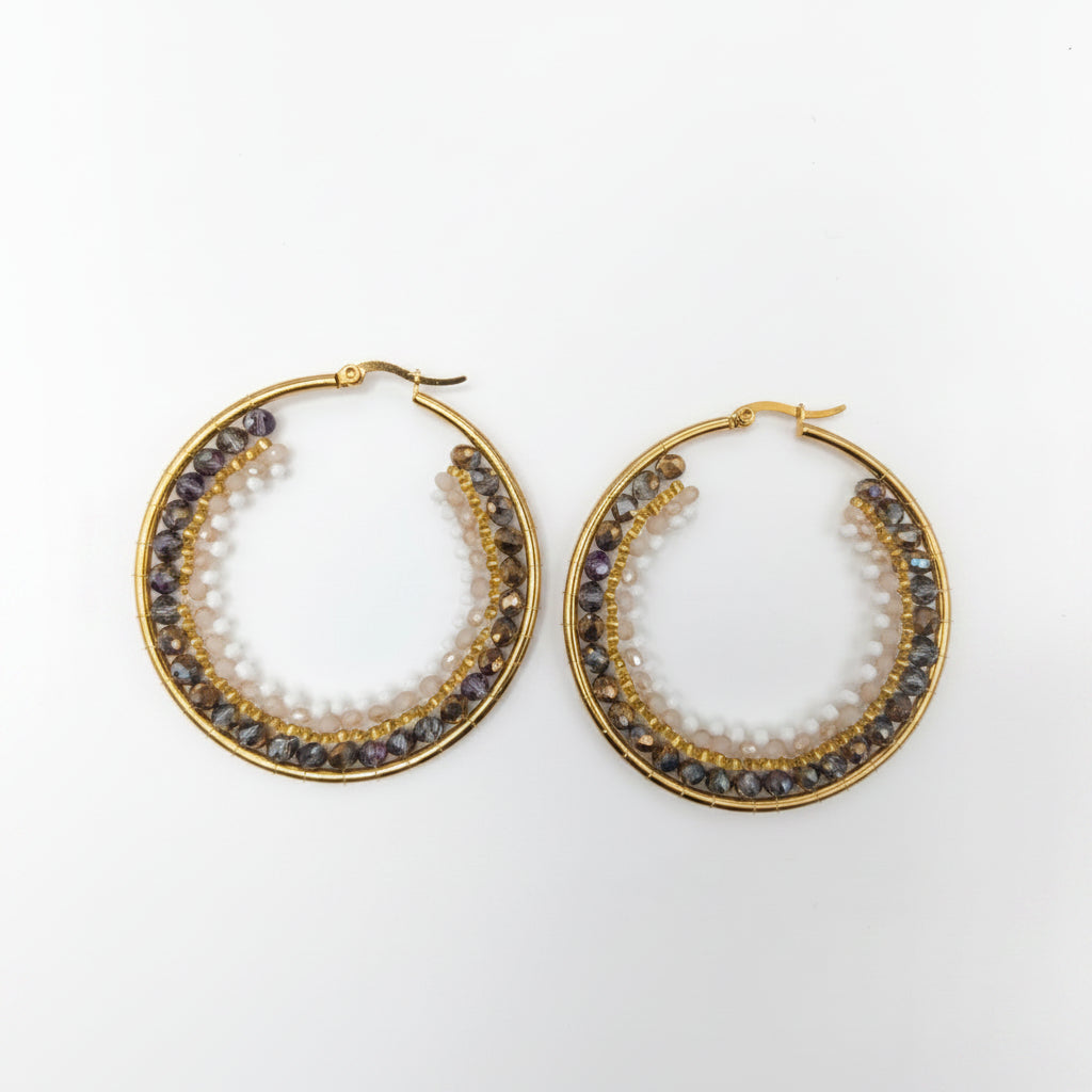 Gold hoop earrings with embedded stones 
