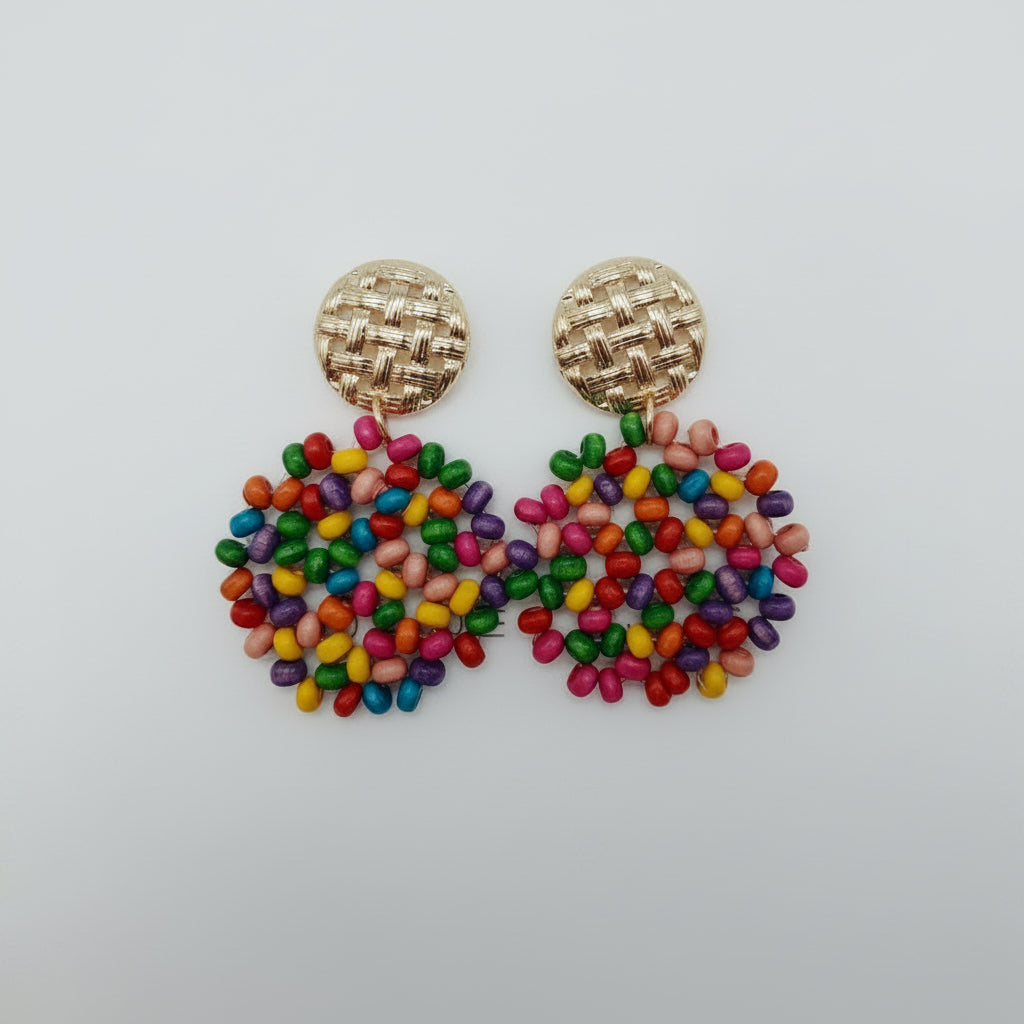 Colorful beaded earrings on a white background