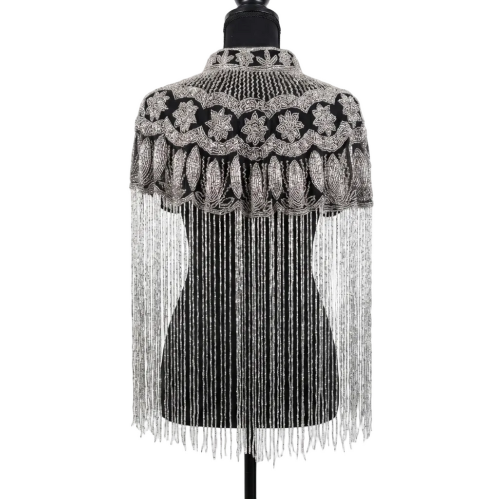 Decorative shawl with intricate patterns and fringes