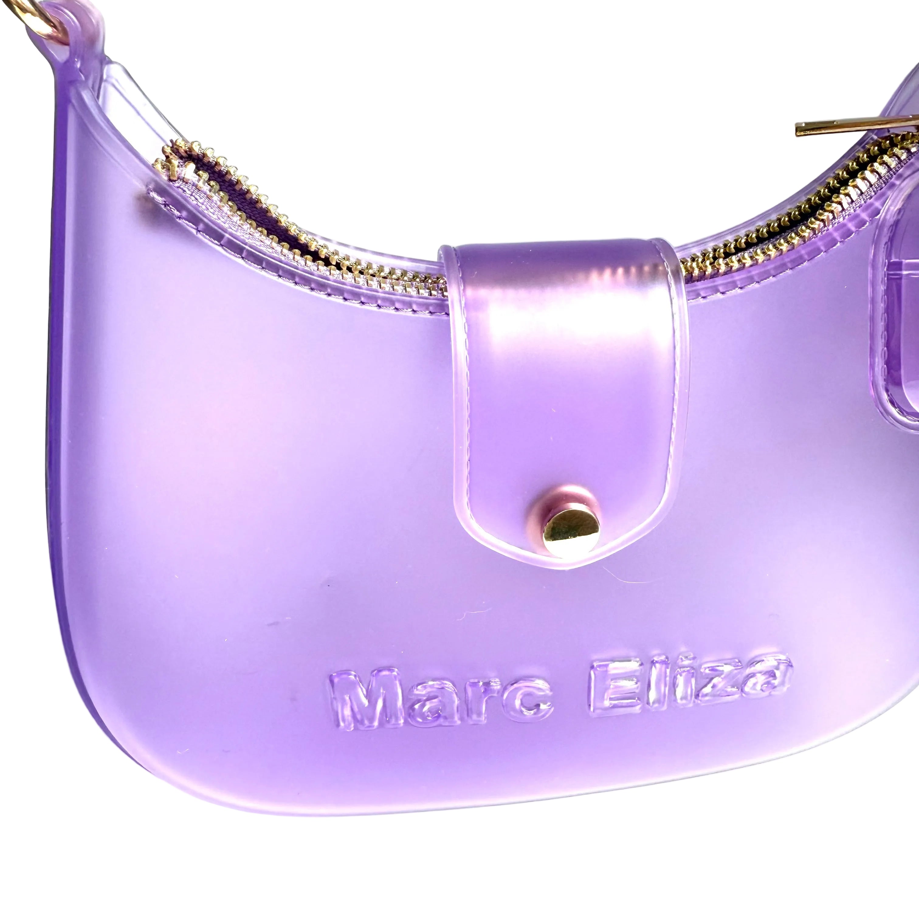 Purple handbag with gold zipper and 'Marc Eliza' branding on a light gray background