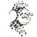Decorative brooch with blue gemstones and gold wire
