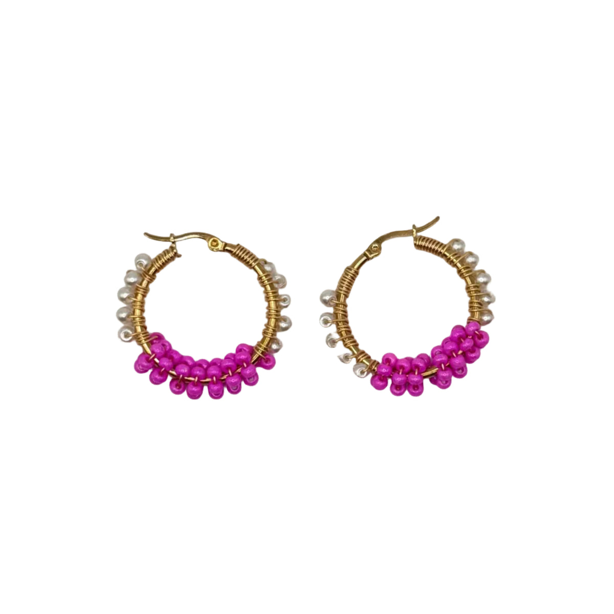 A pair of gold hoop earrings decorated with white faux pearls and a cluster of bright pink beads at the bottom, displayed on a plain light gray background.