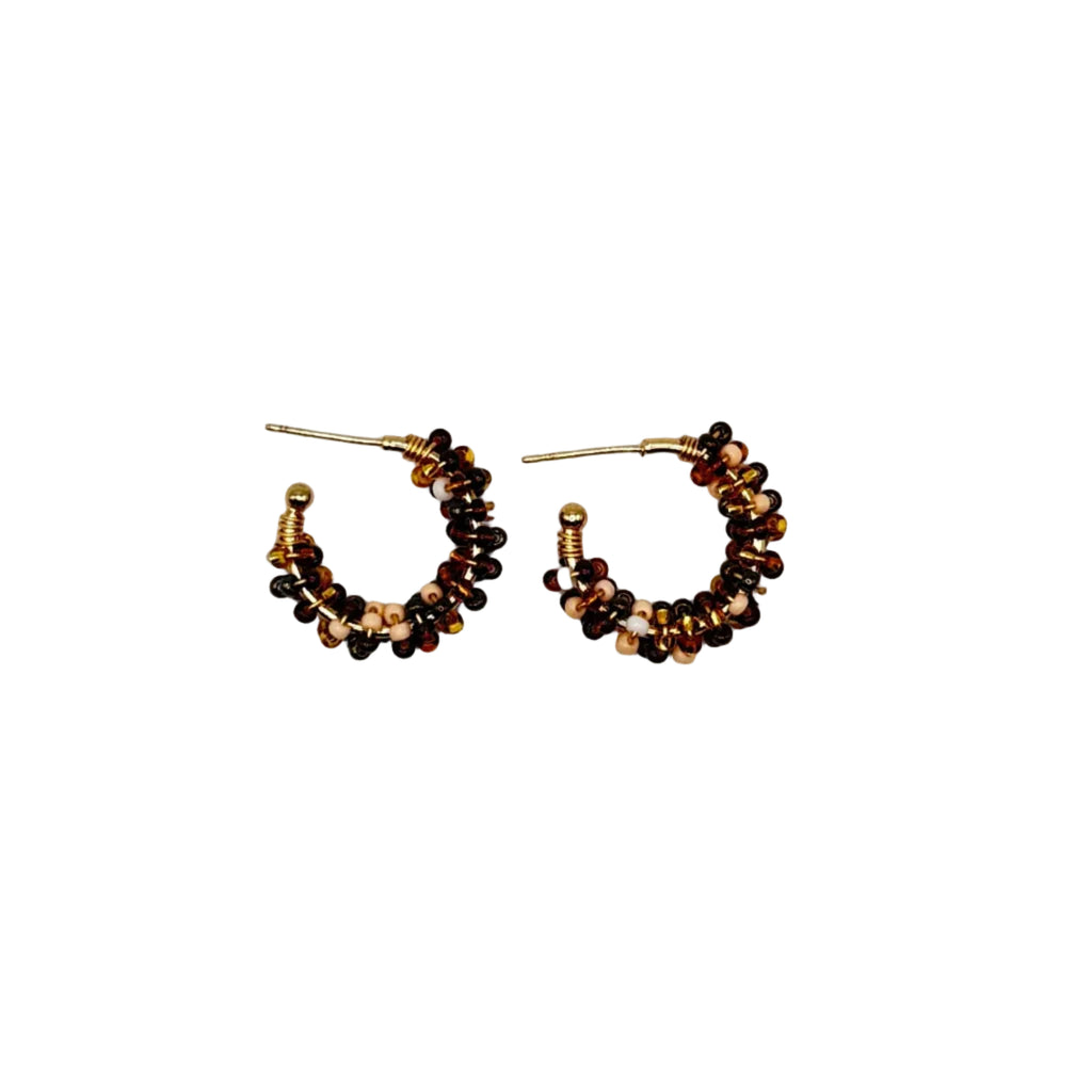 A pair of small gold hoop earrings with clustered dark brown and black beads, displayed on a clean white background.