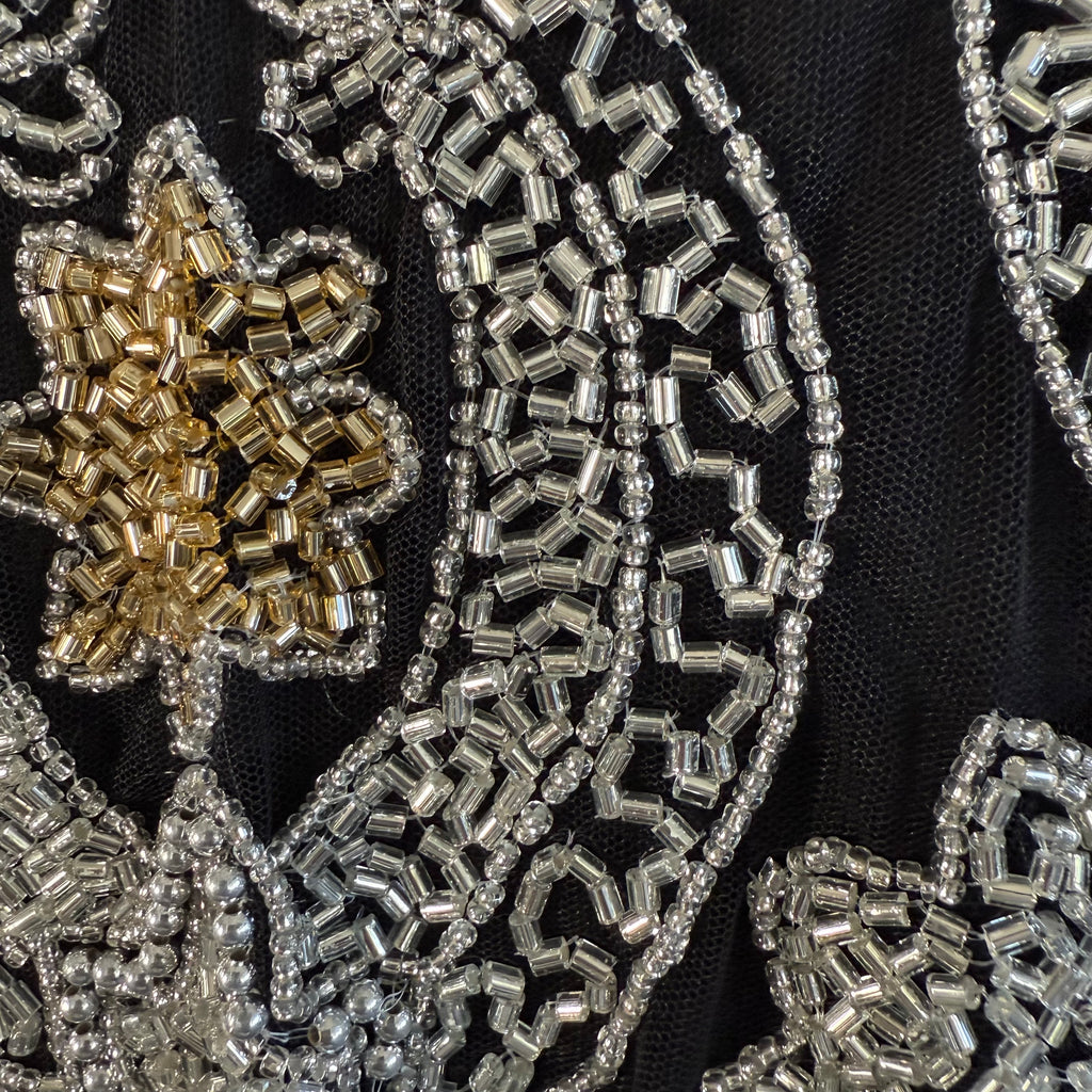 Close-up of intricate beaded patterns